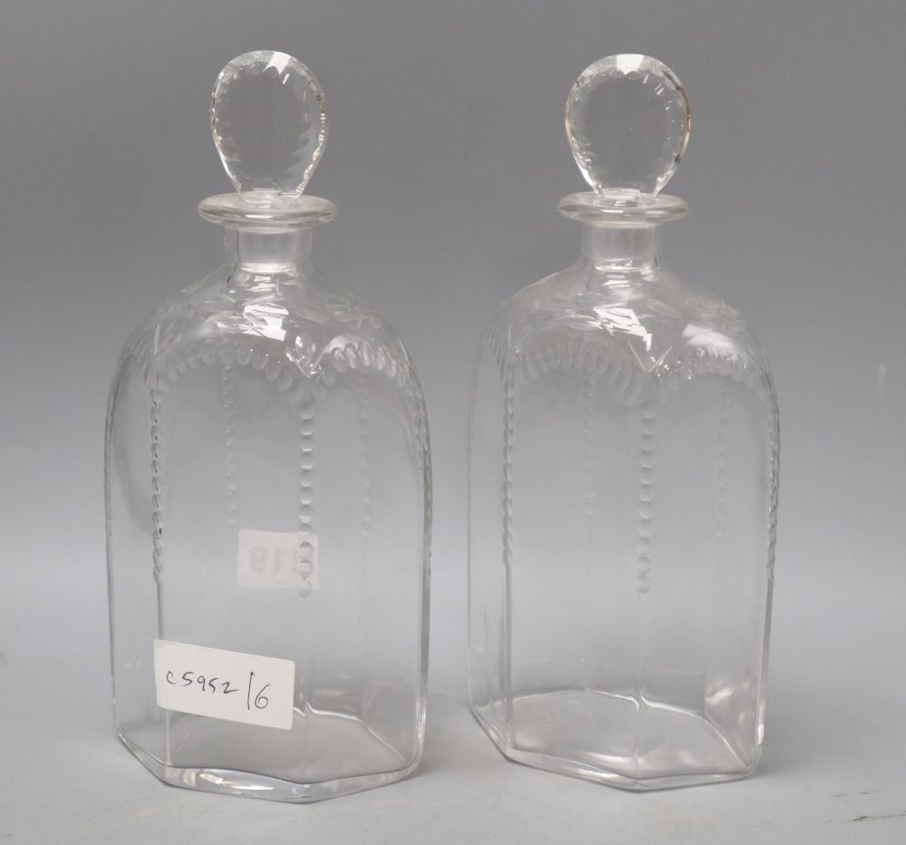 A pair of James Powell Whitefriars hexagonal half-cut glass decanters and stoppers, height 25cm